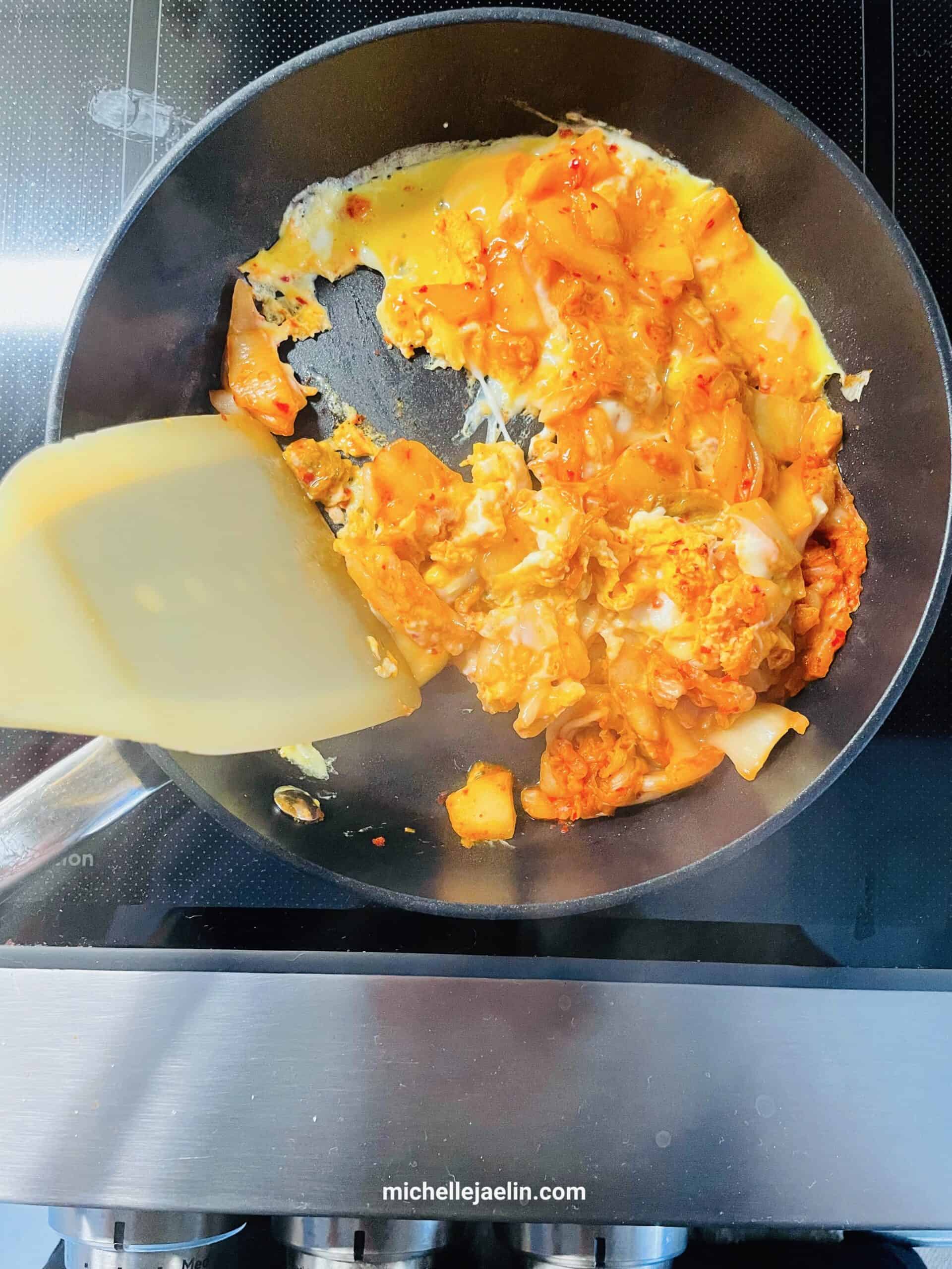 eggs kimchi almost fully cooked