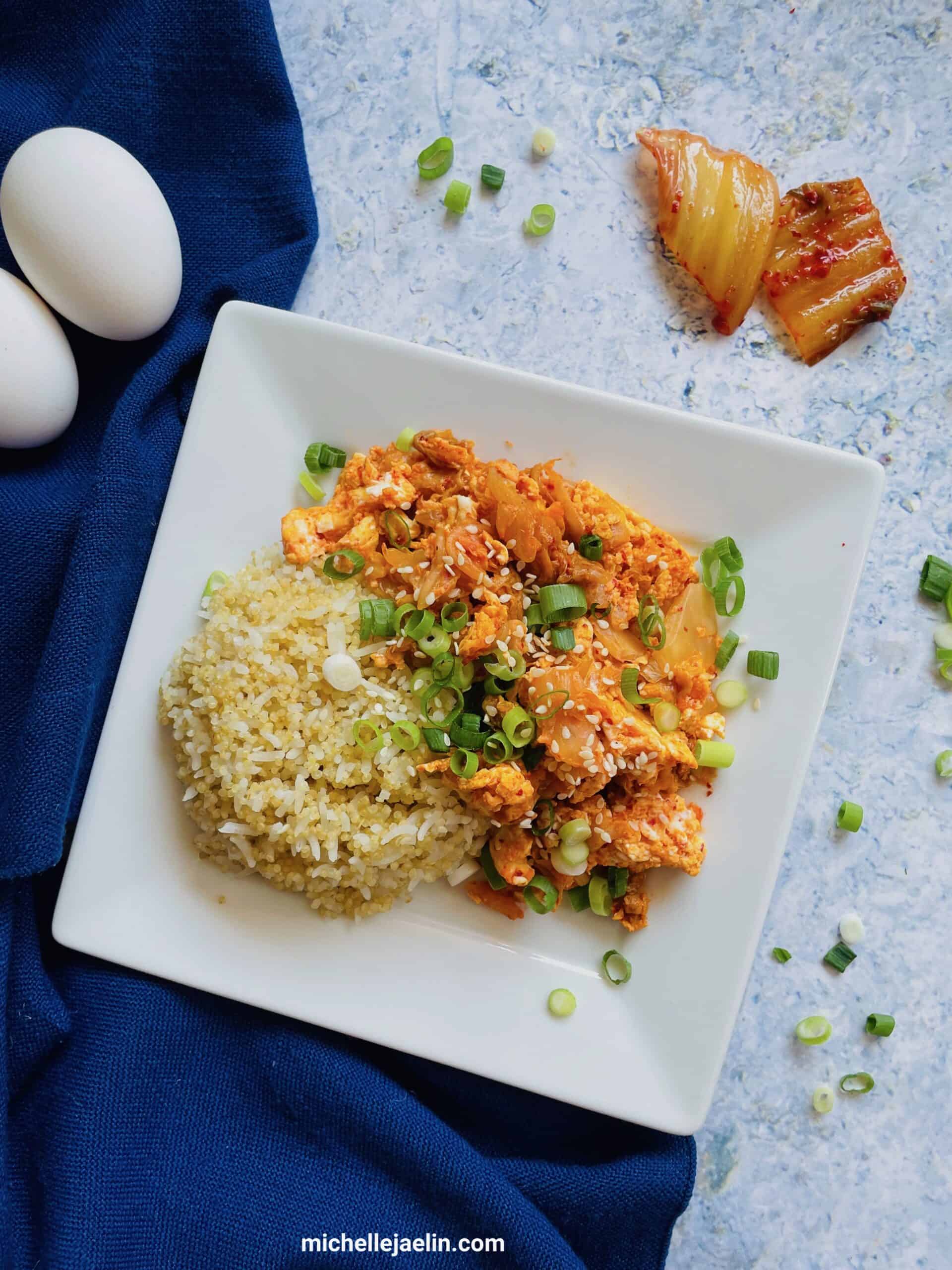 eggs kimchi on a plate quinoa rice. Eggs and kimchi ingredients on the side