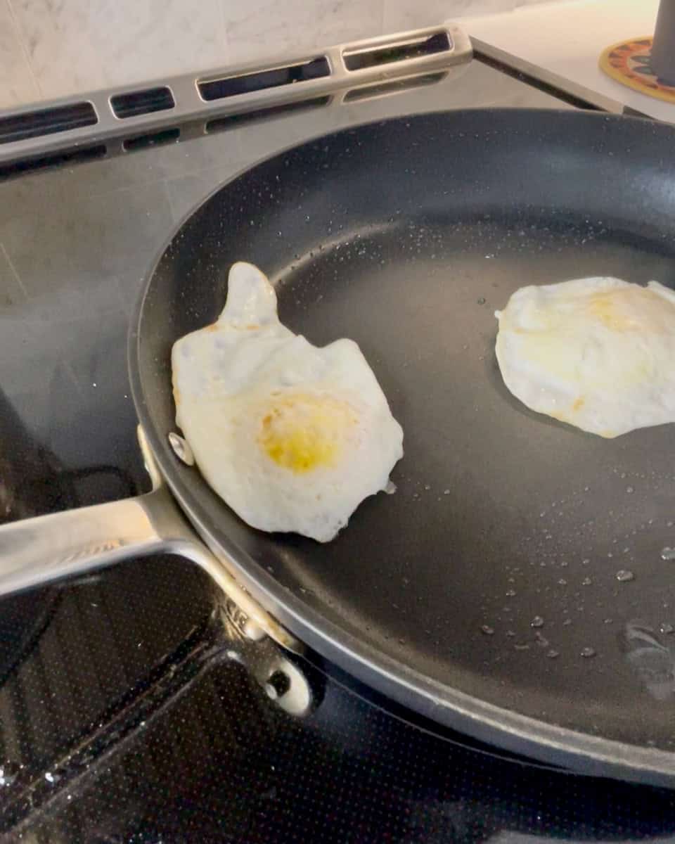 Eggs flipped on the pan