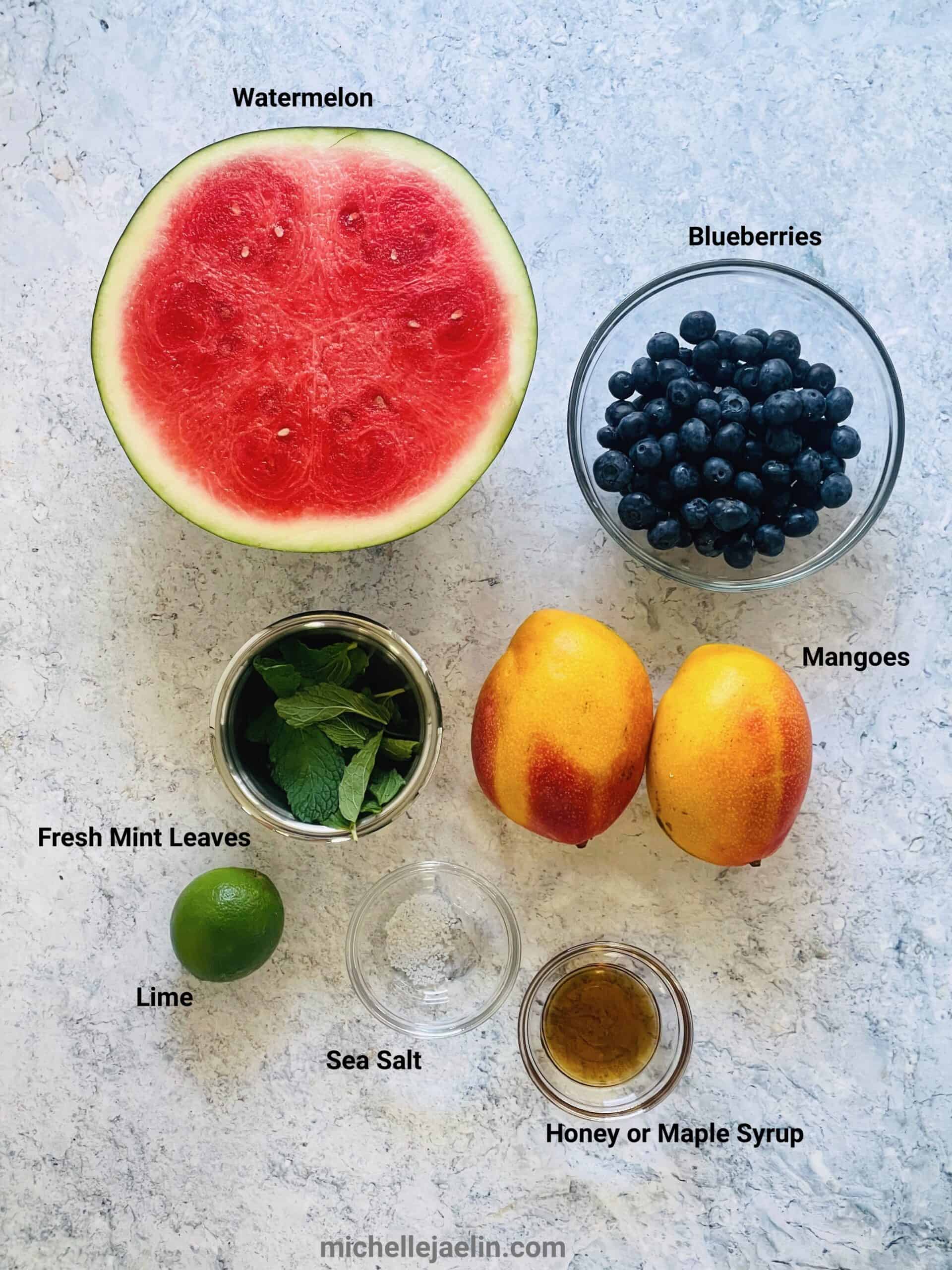 ingredients: half a watermelon, blueberries, mango, fresh mint leaves, lime, honey or maple syrup and sea salt. 